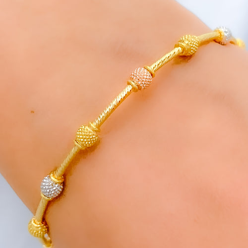 Rose Gold Accented 22k Gold Bangle Bracelet