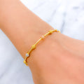 Rose Gold Accented 22k Gold Bangle Bracelet