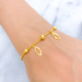 Delicate Fancy Leaf Charm 22k Gold Bracelet