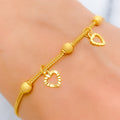 Timeless Heart Charm 22k Gold Bracelet