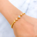 Impeccable Two-Tone Sequin 22k Gold Bangle Bracelet