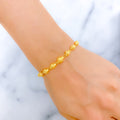 High Polish Striped 22k Gold Orb Bracelet