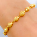 High Polish Striped 22k Gold Orb Bracelet