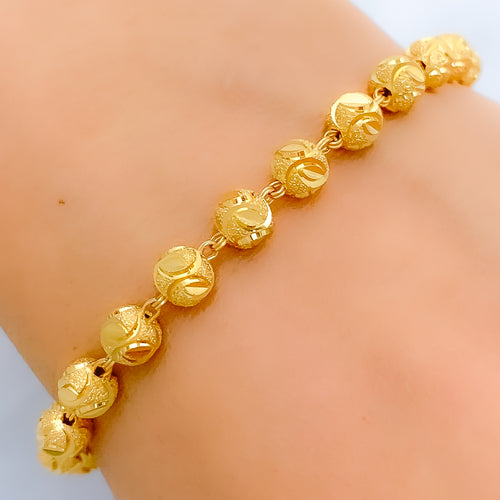 Leaf Accented 22k Gold Orb Bracelet