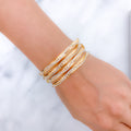 Elegant White Gold Accented Wave 22k Gold Bangles