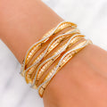 Elegant White Gold Accented Wave 22k Gold Bangles