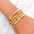 Elegant White Gold Accented Wave 22k Gold Bangles