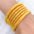 Traditional Fancy Cut Pipe Gold Bangles
