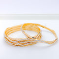 Elegant White Gold Accented Wave 22k Gold Bangles