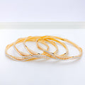 Elegant White Gold Accented Wave 22k Gold Bangles