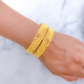 Floral Accented Wave 22k Gold Bangles