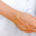 Reflective Three-Tone 22k Gold Wire Bracelet