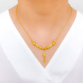Elegant Striped Orb 22k Gold Necklace