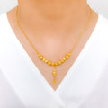 Elegant Striped Orb 22k Gold Necklace