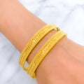 Upscale Radiant Flower-Lined 22k Gold Bangles