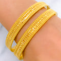 Upscale Radiant Flower-Lined 22k Gold Bangles