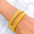 Upscale Radiant Flower-Lined 22k Gold Bangles