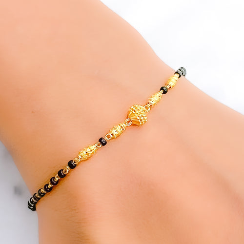 Tasteful Shining Black 22k Gold Bead Bracelet