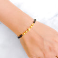 Shimmering Two-Chain Orb 22k Gold Bracelet