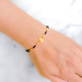 Glistening Bright Black Bead 22k Gold Bracelet