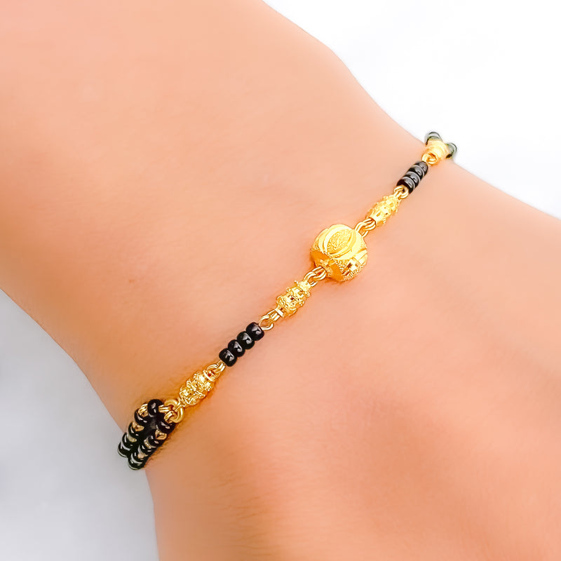 Glistening Bright Black Bead 22k Gold Bracelet