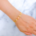 Graceful Dotted Three-Tone 22k Gold Bangle Bracelet