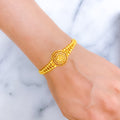 Upscale Floral Rakhi-Style 22k Gold Bracelet