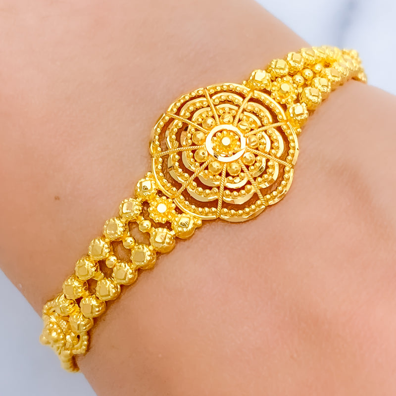 Upscale Floral Rakhi-Style 22k Gold Bracelet