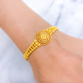 Upscale Floral Rakhi-Style 22k Gold Bracelet