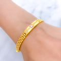 Elegant Interlinked CZ 22k Gold Bangle Bracelet