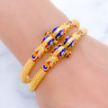 Gorgeous Peacock Adorned 22k Gold Bangles