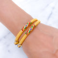 Gorgeous Peacock Adorned 22k Gold Bangles