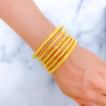 Iconic Reflective Gold Bangles