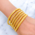 Iconic Reflective Gold Bangles