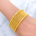 Iconic Reflective Gold Bangles