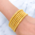 Iconic Reflective Gold Bangles