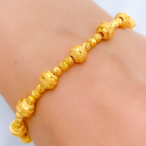 Upscale Striped Slender 22k Gold Bracelet