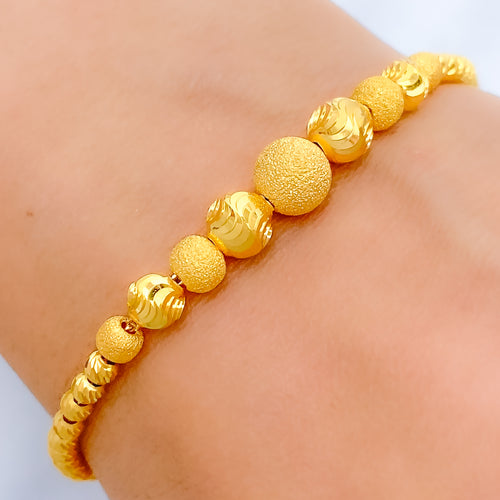 Modest Alternating 22k Gold Ball Bracelet