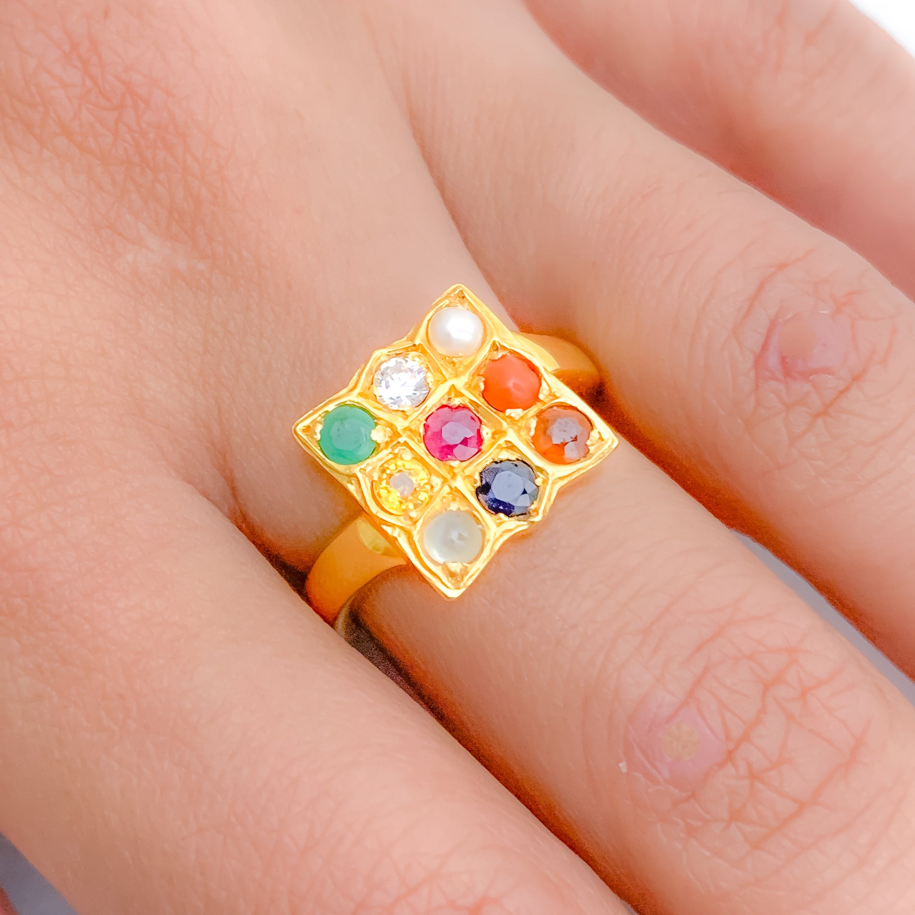 Unnikrishnan Sivas Jewellery - 22K Gold Navaratna Ring Adorn Your Fingers  With The Nine Hues Of Bliss Get your favourite designs from our latest and  unique Navaratna Ring collection. 🌐www.sivasgems.com 📍Rolla Sharjah
