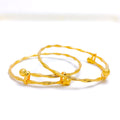 22k-gold-Contemporary Twisted Baby Bangle Pair