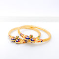 Gorgeous Peacock Adorned 22k Gold Bangles