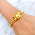 Exclusive Overlapping Leaf Bangle Bracelet