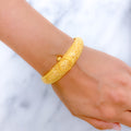 Shimmering Floral Screw 22k Gold Bangle