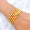 Radiant High Finish Set of 4 22k Gold Bangles