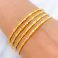 Radiant High Finish Set of 4 22k Gold Bangles