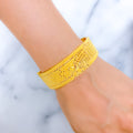 Classy Flower Accented Bangle 22k Gold 