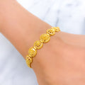 22k-gold-graduating-upscale-round-floral-bracelet