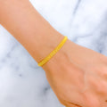 22k-gold-graceful-flat-bracelet