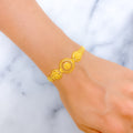 22k-gold-decorative-triple-flower-bracelet