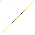 22k-gold-tasteful-black-bead-bracelet